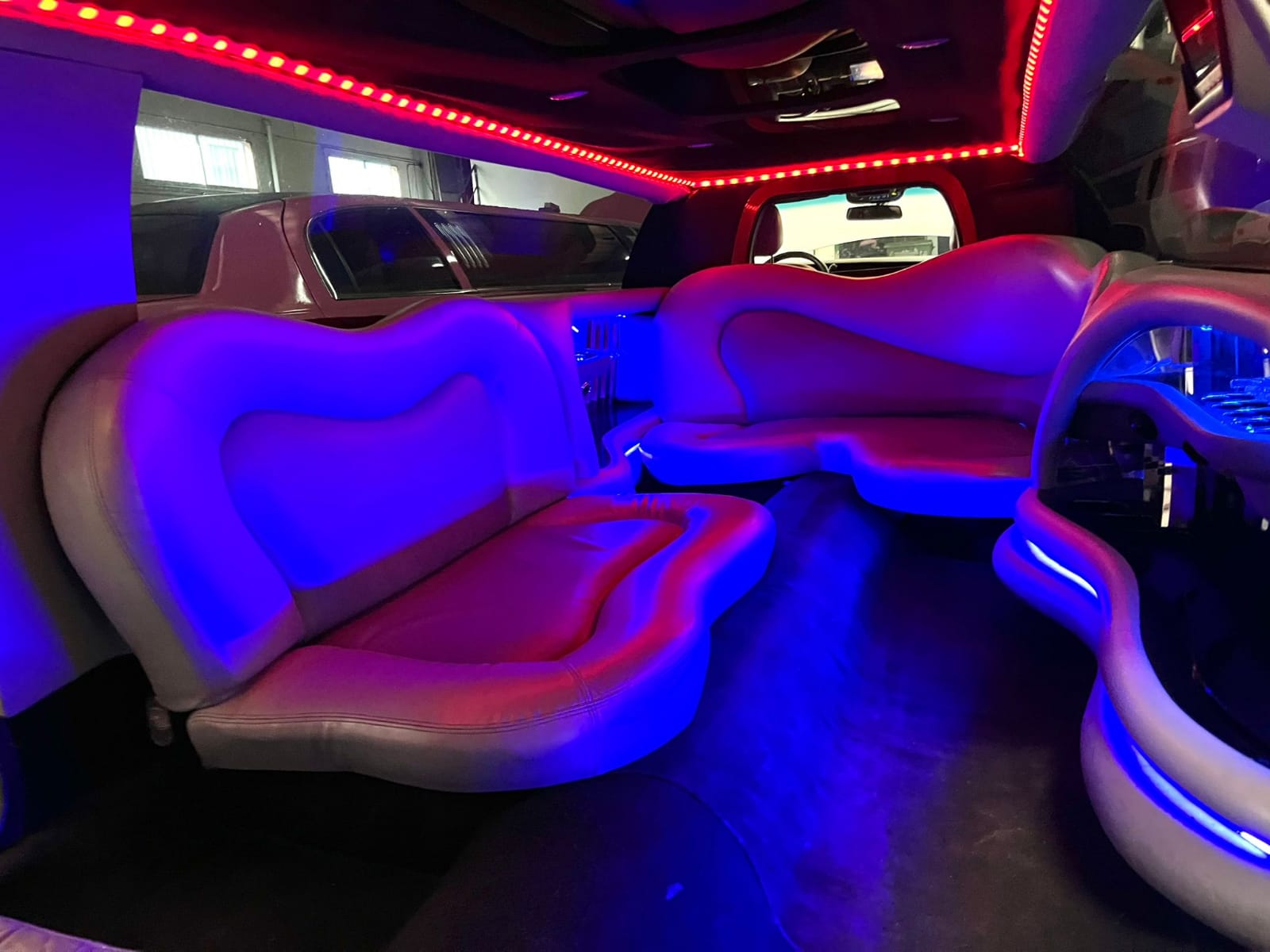Lincoln limousine interior with red and blue LED lighting